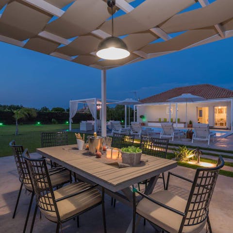 Sit down for an alfresco meal after a round of sunset drinks