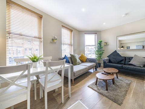 Dine together in a casual living space before enjoying a tipple at the local pub