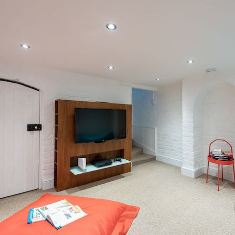 Descend to the basement for movie nights and gaming