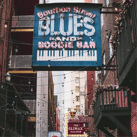 Explore Bourbon Street, a ten-minute drive away