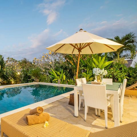 Wine and dine on the poolside terrace