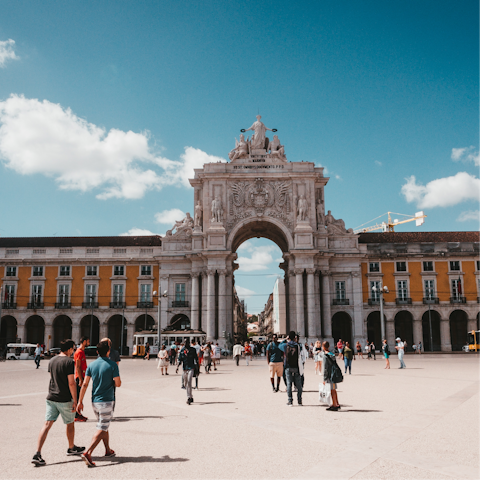 Hop on the metro and ride over to Praça do Comércio