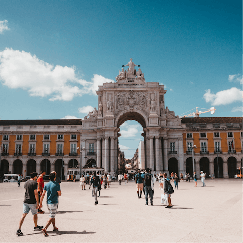 Hop on the metro and ride over to Praça do Comércio