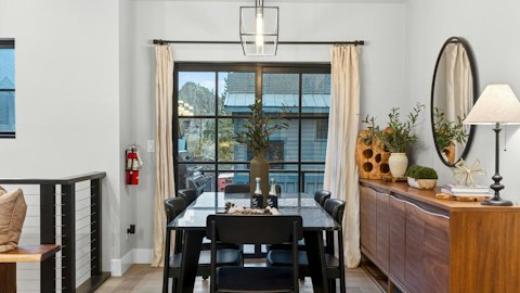 Gather around the table to share dinner and drinks after a day at the lake