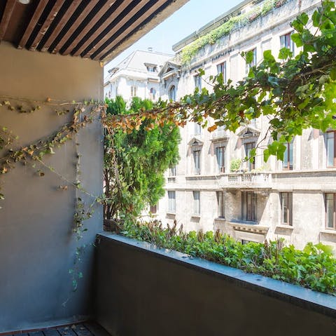 Enjoy your morning coffee out on the verdant balcony