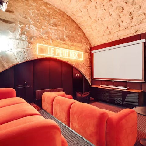 Curl up and watch your favourite movie in the home cinema