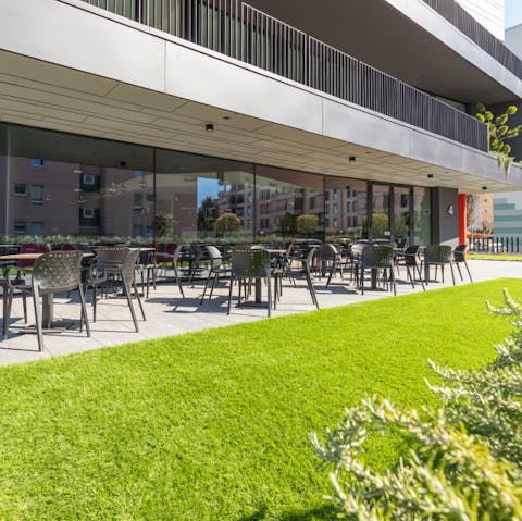 Dine alfresco in the communal garden and restaurant