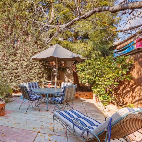 Sip wine on the alfresco table