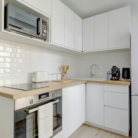Fire up the coffee pod machine in the sleek kitchen area