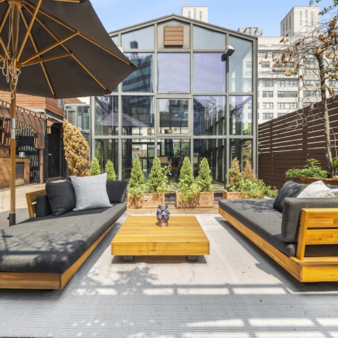 Unwind in the rooftop conservatory or on the expansive terrace