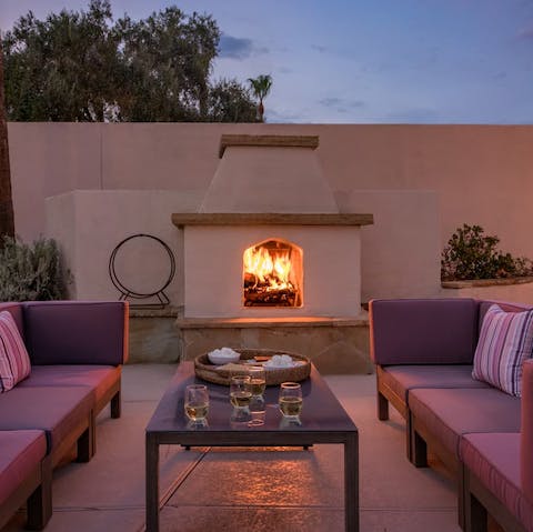 Cosy up around the fire pit on the patio for an evening nightcap