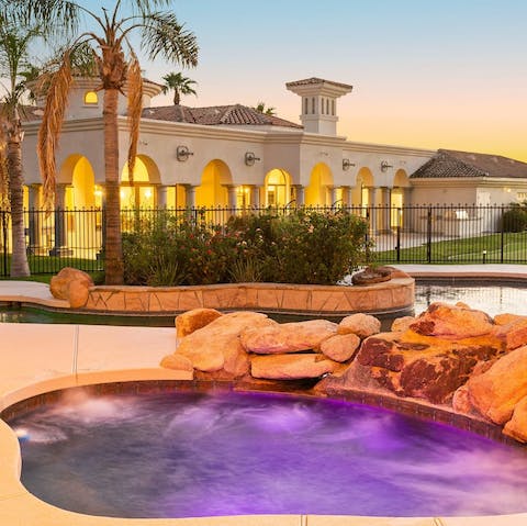 Unwind in the bubbling hot tub come night fall