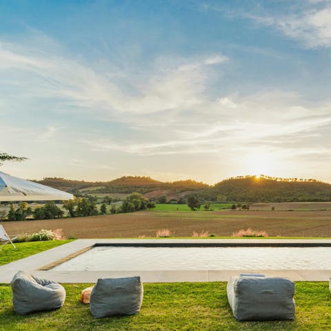 Admire sweeping countryside views from the private pool
