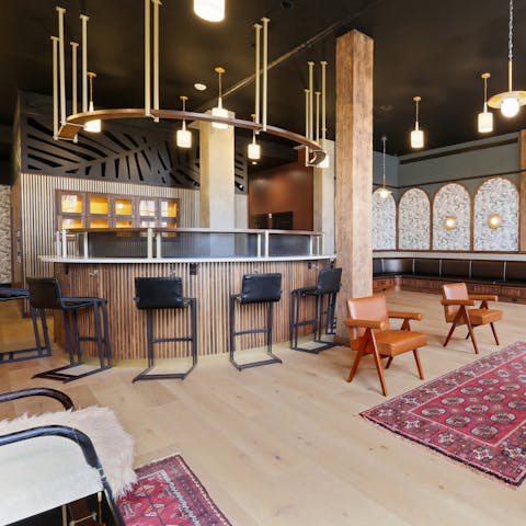 Have a drink at the shared lounge