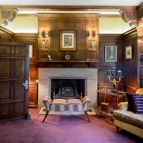 Cosy up in front of the grand fire place