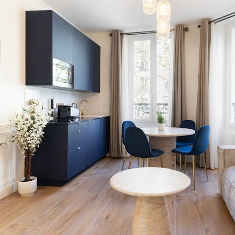 Begin each day with a coffee and croissant in the chic kitchen space