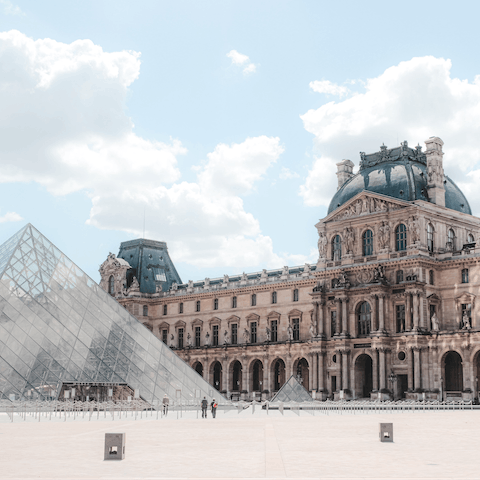 Take a twelve-minute stroll through the streets of Paris to visit the iconic Louvre Museum