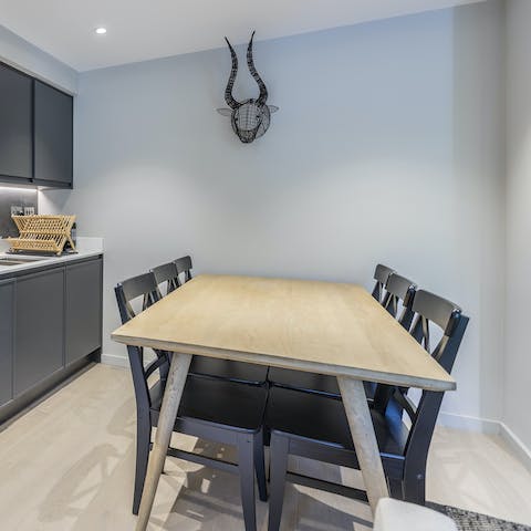 Gather around the dining table for cosy dinners, drinks, and board games at home