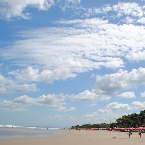 Stroll down the road to Seminyak Beach for a day of relaxation