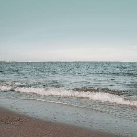 Spend days on the sandy beach – just 500m away