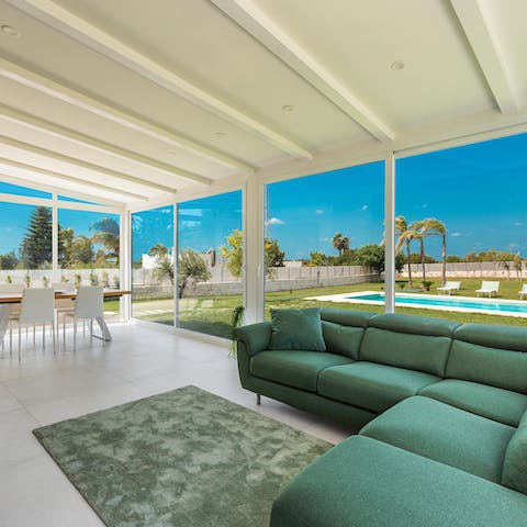 Take in the views of the gardens with their fruit trees and Mediterranean plants