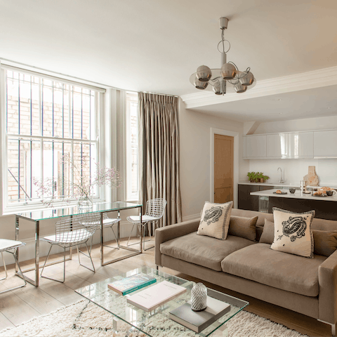Mix a gin and tonic to enjoy in the gorgeous living space