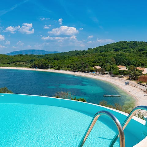 Enjoy expansive views across Avlaki Bay whilst swimming in the pool