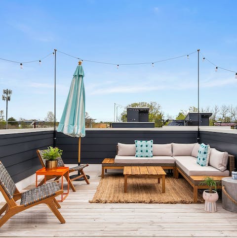 Make your way up to the rooftop terrace and enjoy drinks under the festoon lights