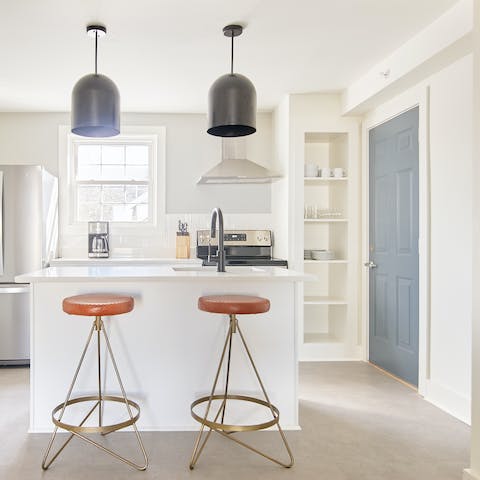 Fire up the coffee machine and come together at the breakfast bar to hatch plans for the day ahead