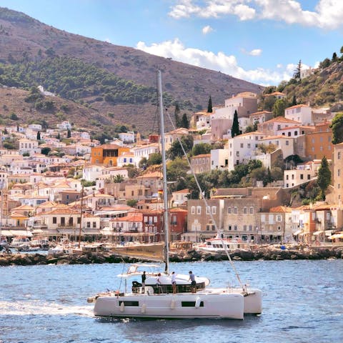 Experience the idyllic beauty of Hydra with a boat trip around the island