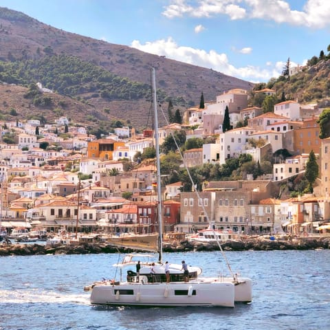 Experience the idyllic beauty of Hydra with a boat trip around the island