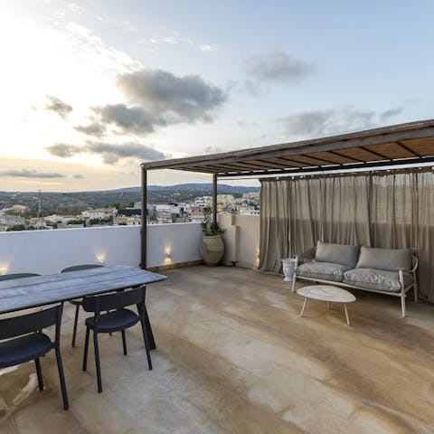 Head up onto the shared roof terrace to soak up the Sicilian views