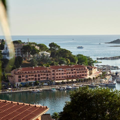 Wander the coastal town and pebble beaches of Vrsar, 16km away