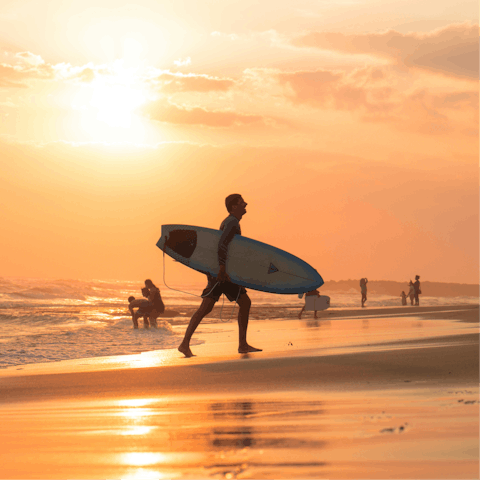 Surf on Canggu beach, only a 10-minute drive away