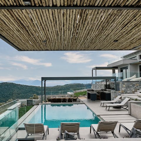 Take a cooling dip in one of the pair of swimming pools before retiring to the hot tub