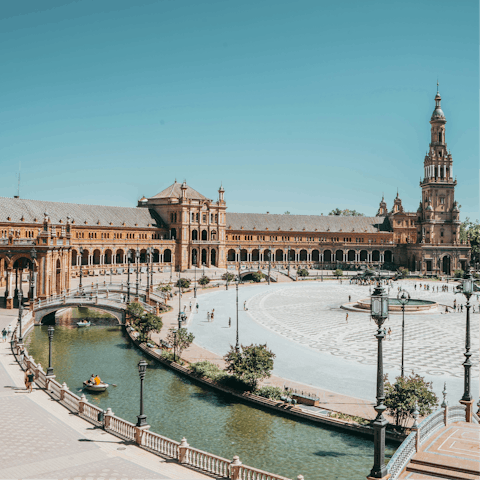 Begin sightseeing at the iconic Plaza de España