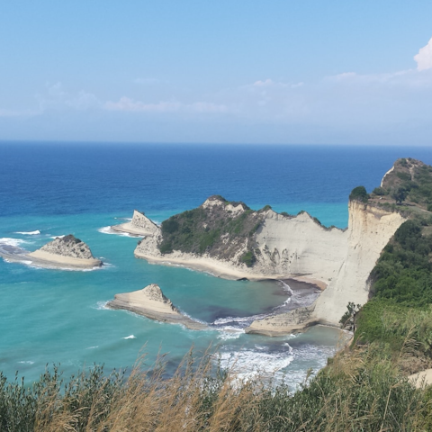 Explore Corfu, including Pontikonisi beach, 5 kilometres away