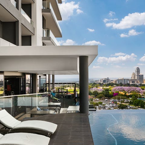 Relax by the communal infinity pool or take a dip in its shimmering waters