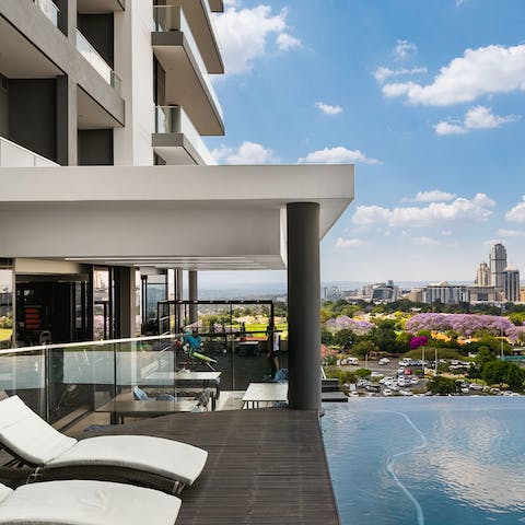 Relax by the communal infinity pool or take a dip in its shimmering waters