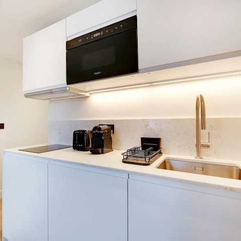 Cook in the compact kitchen for an easy evening in