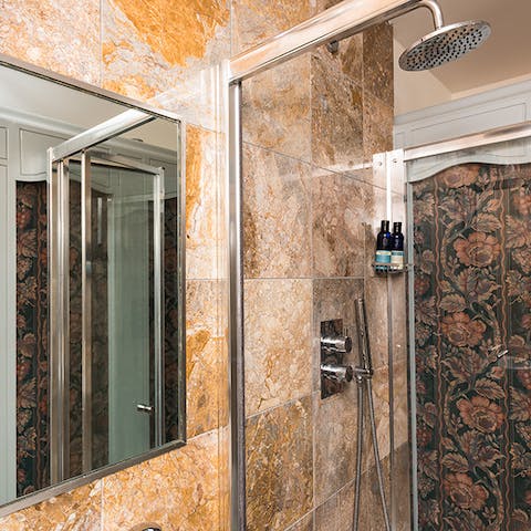 Showering in a floral shower cubicle