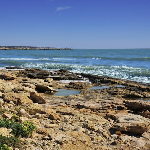 Walk the rugged coasts of the island's south-eastern shores