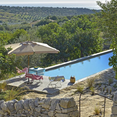 Follow the stone steps down to the private swimming pool