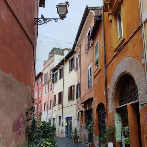 Appreciate the rustic architecture of the streets of Trastevere