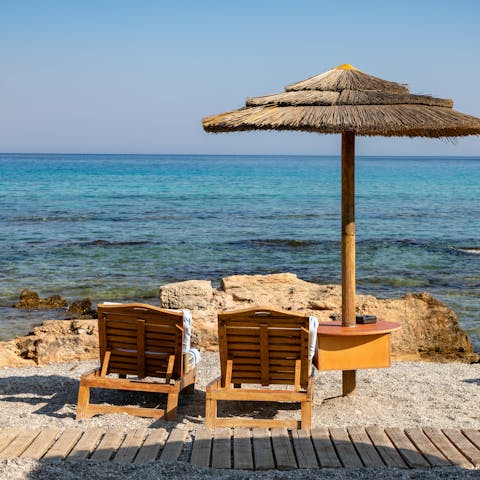 Indulge in some watersports at nearby Lardos beach