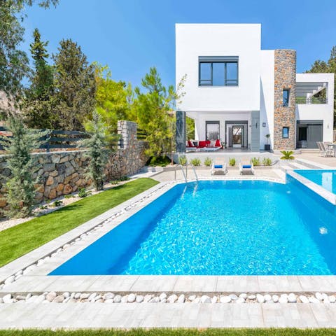 Swim in the private pool as the Greek sun warms your skin