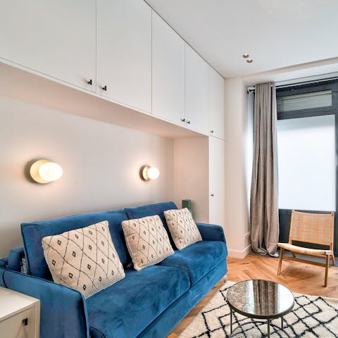 Kick back on the sofa with a glass of something local