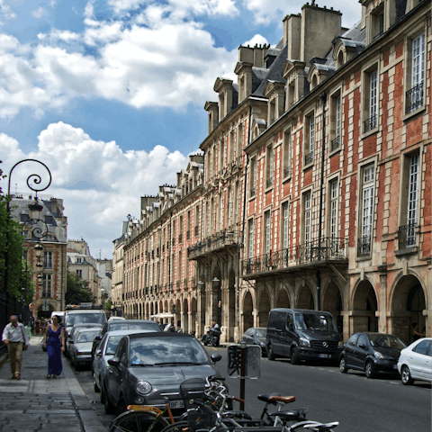 Stop at a local boulangerie for a picnic to bring to Place des Vosges, a fourteen-minute walk from home