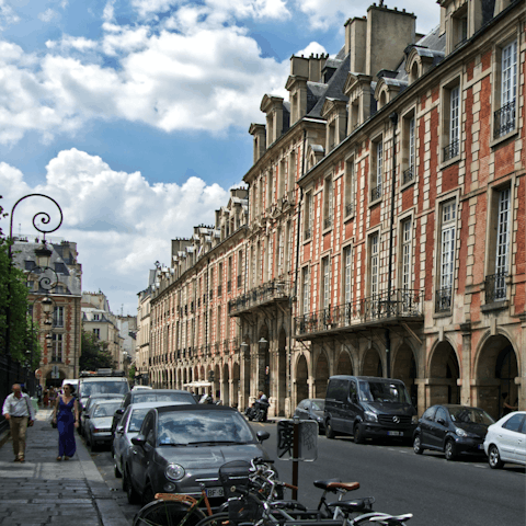 Stop at a local boulangerie for a picnic to bring to Place des Vosges, a fourteen-minute walk from home