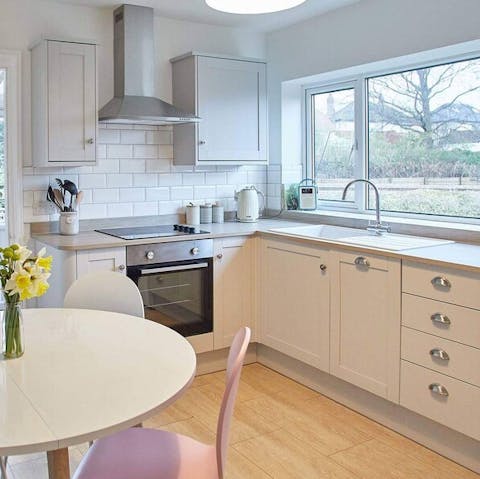 Cook up a delicious homegrown meal in the contemporary and fully equipped kitchen